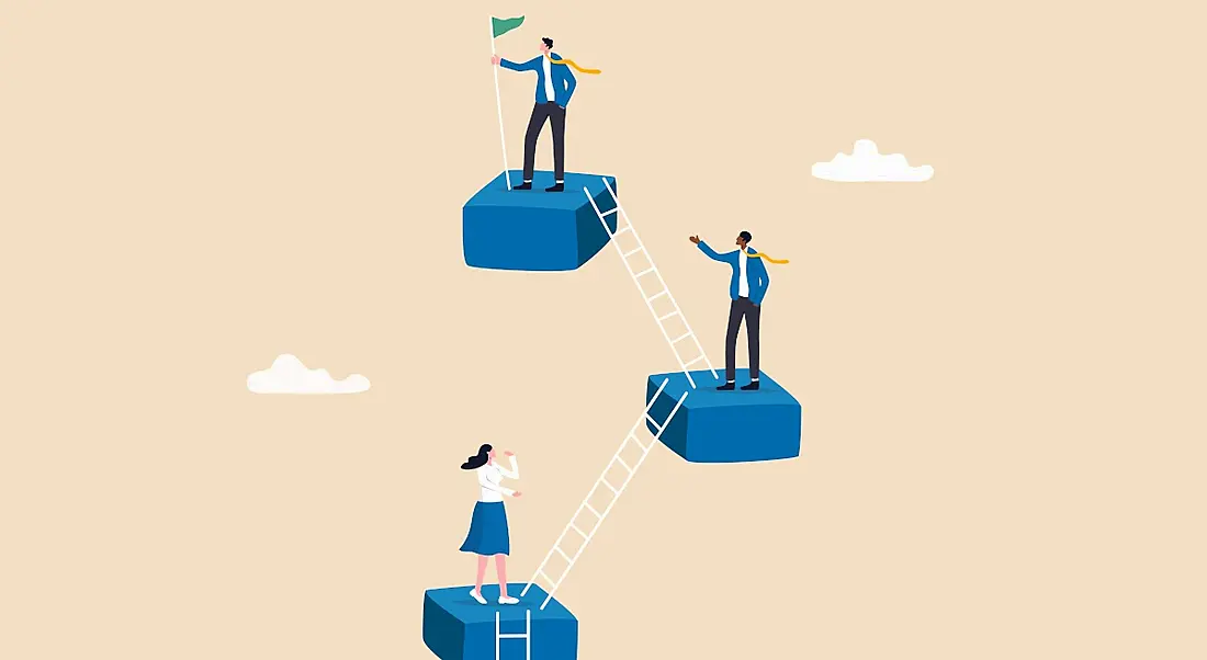 Three blue blocks in a sky connected by ladders with one person on each, symbolising early-stage workers climbing a career ladder.