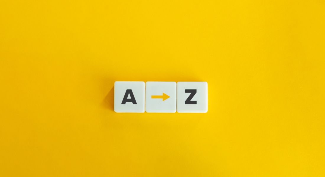 Bright yellow background with three white tiles with the letters 'A' and 'Z' and an arrow in between.
