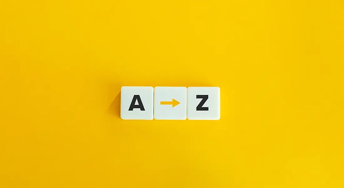 Bright yellow background with three white tiles with the letters 'A' and 'Z' and an arrow in between.