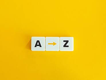 Bright yellow background with three white tiles with the letters 'A' and 'Z' and an arrow in between.