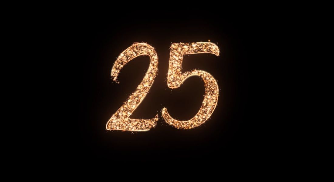 The number 25 in sparkling gold lettering on a dark, plain background.