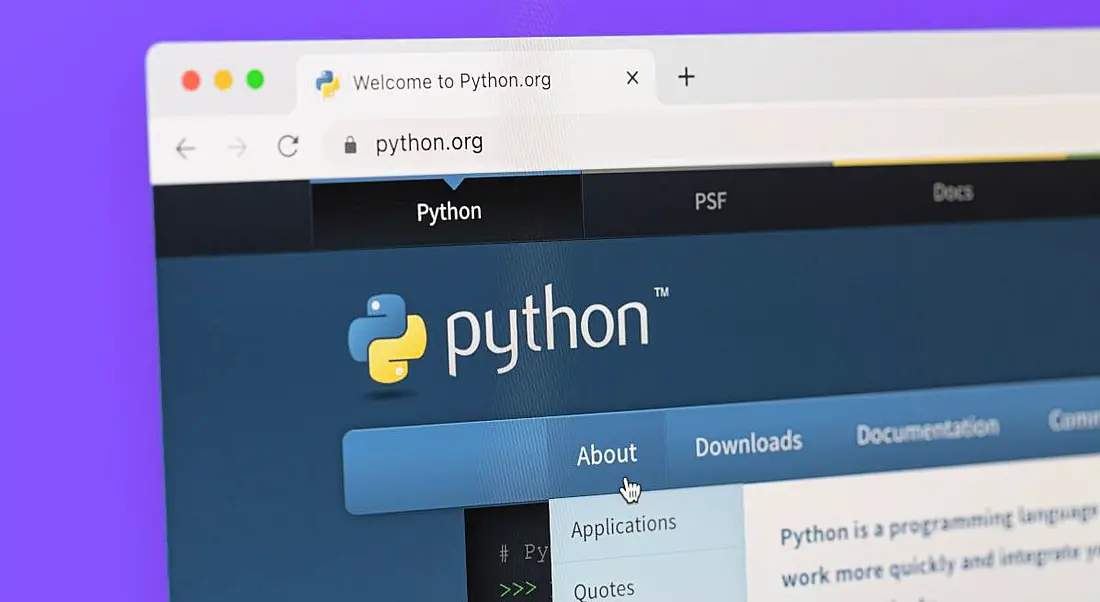 The Python.org official website open on a browser tab on a computer screen.