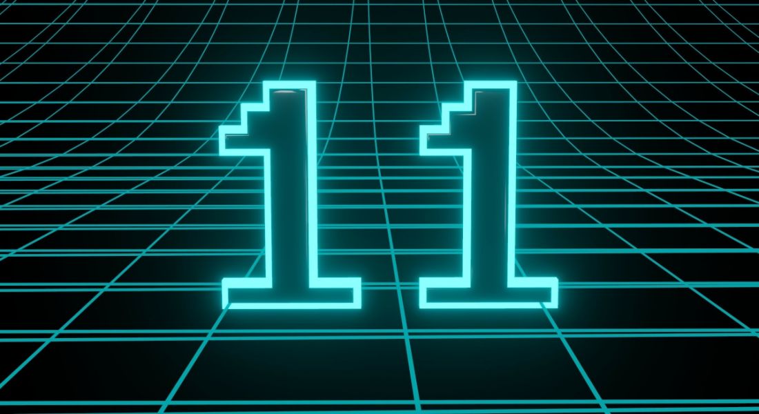 The number 11 in neon blue lights sitting on a grid.