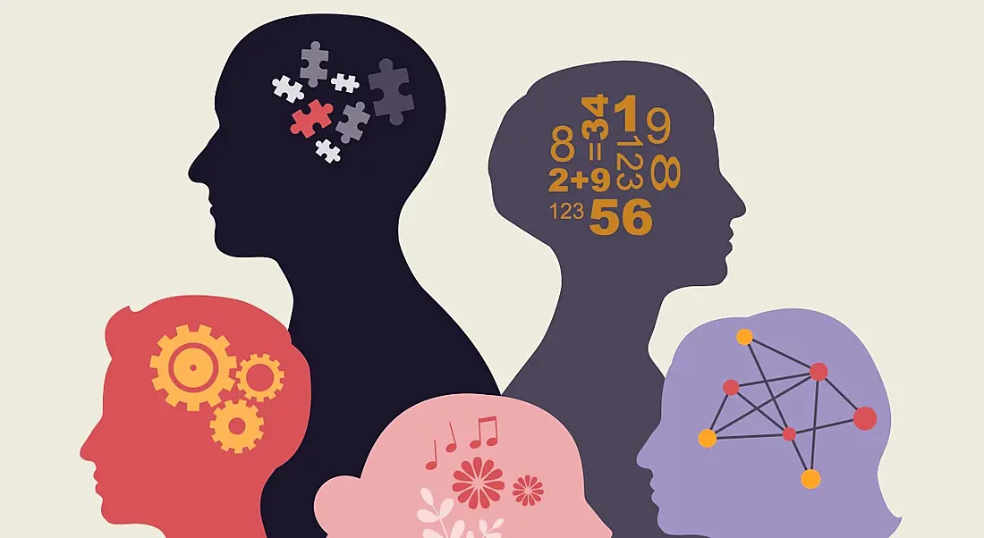 An illustration of five silhouettes of different people, each with a different colour and with different shapes and objects in their heads. This symbolises neurodiversity.