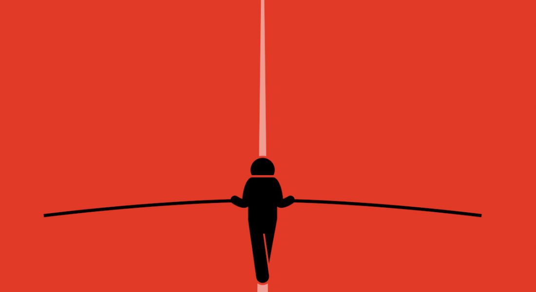 Cartoon of a figure balancing on a tightrope carrying a balancing aid. The background is a vivid red.