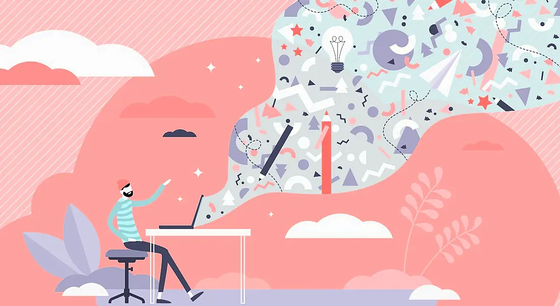 Cartoon of a creative person sitting at their desk unleashing a wave of creativity from their computer. There is a pink background.