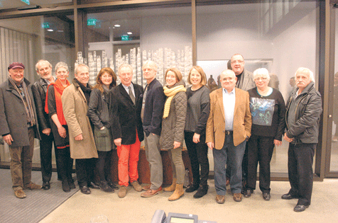 The board of Uillinn, the new arts centre in Skibbereen, pictured with artist Michael Ray whose glass and steel sculpture graces the entrance of the centre