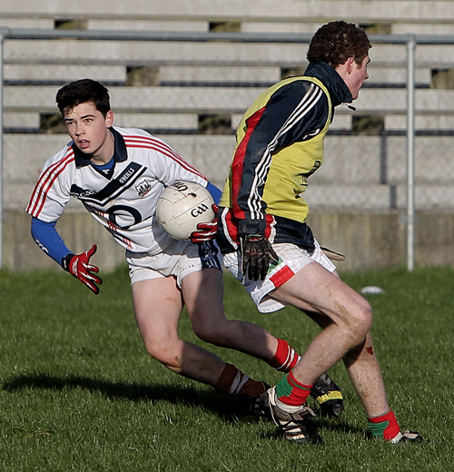 Darren Santry gets around Zach Harrington during a Clonakilty Community College training session at Ahamilla on Saturday morning.