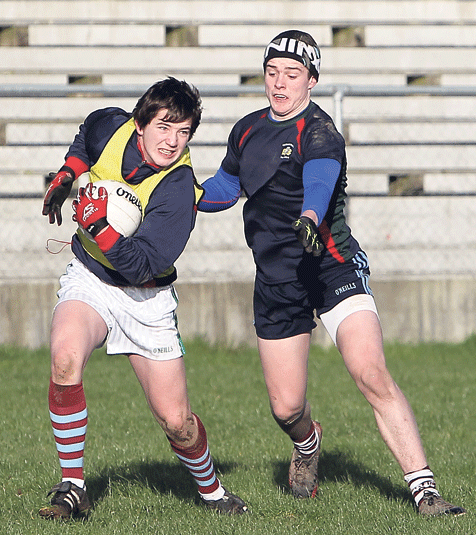 Practice makes perfect: David Kiely breaks away from Ogie Scannell during a Clonakilty Community College training session at Ahamilla last Saturday.  
