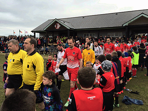 Teams walk out onto the field ahead of Cork City v Skibbereen on Saturday afternoon.