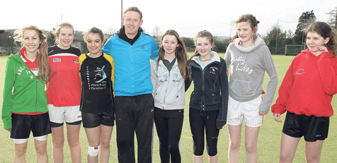 Tips from a great: Members of the Sacred Heart Secondary School, Clonakilty, football team pictured with Kerry footballer Colm Cooper on his recent visit to the school.