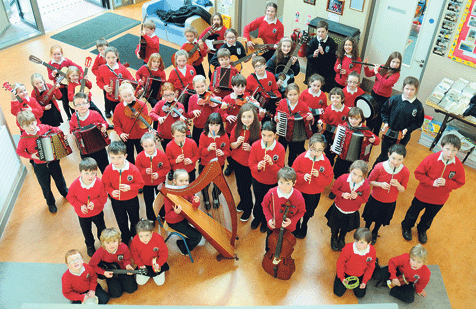 Some of the Gaelscoil Bheanntraí pupils who have benefitted from the grant which provided for musical instruments.                     