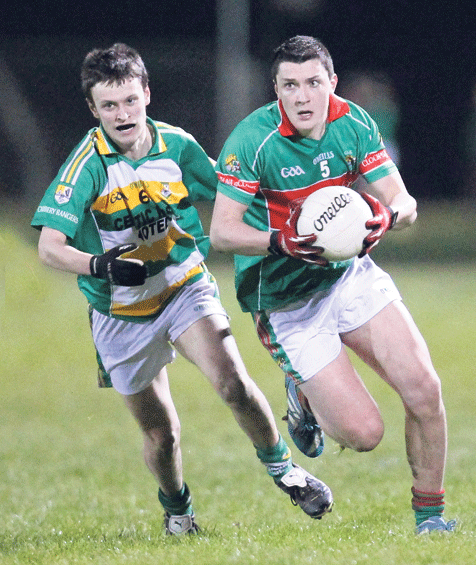 Follow my lead: Clonakilty U21 captain Martin Scally races away from Carbery Rangers Gearoid OBrien during the 2014 South West U21 A football championship quarter-final.