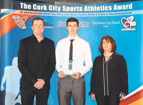 Talented: Leevale athlete Sam Healy with his parents Ger and Paula after he collected a Cork City Sports Athletic Person of the Month Award. 