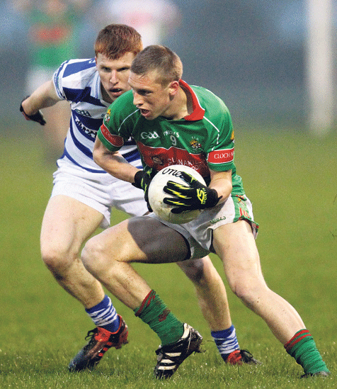 Experience: Clonakiltys Sean White cuts inside Castlehavens Jonathon Burns during the 2014 Clona Milk U21 A football championship final. White was centre back for the Cork U21s last season.