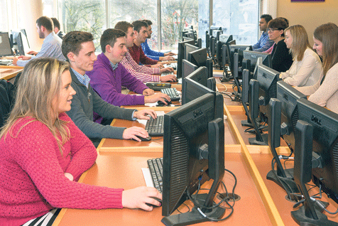 Masters students at Cork University Business School (CUBS)  trade in the financial markets at the launch of the new QSTC Trading Lab located in the Department of Accounting, Finance and Information Systems at UCC.  