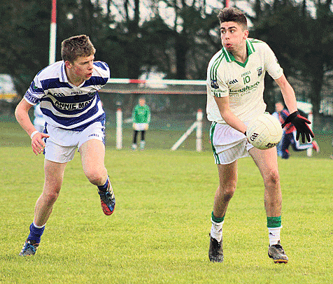 In pursuit: Castlehavens David Whelton chases down Ilen Rovers Shane Kearney during their South West U21 A football championship semi-final in Skibbereen on Sunday.