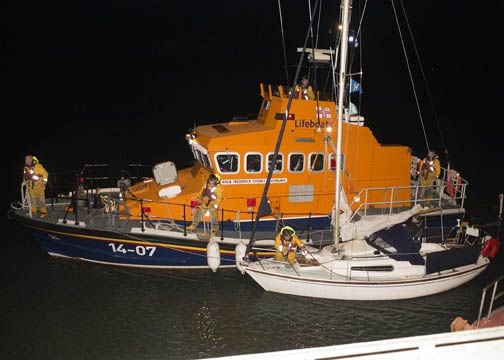 The rescued yacht being towed back to Courtmacsherry