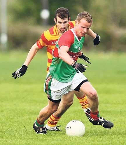 In control: Clonakiltys Donal Lyons is first to the ball in the county senior football championship round one loss to Newcestown.