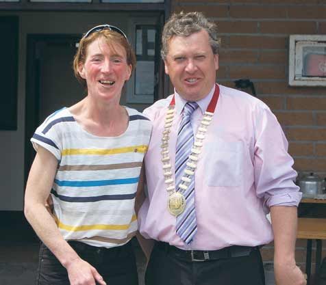 Impressive run: Local athlete Anna ONeill, third in the Dunmanway 10km, pictured with Bill Allen, chairman of the Cork County Board of Athletics Ireland.   