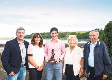 Celtic Ross West Cork Sports Star of the Month for May, Gavin Sheehan, centre, pictured with, from left, Sean and Geraldine Sheehan, and Maureen and Denis Crowley at the presentation last week.     
