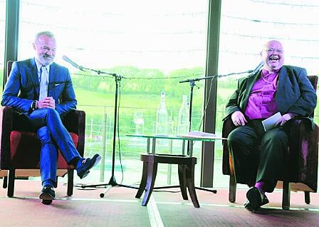 Graham Norton on stage with Bishop Paul Colton at the Maritime Hotel last Friday night.