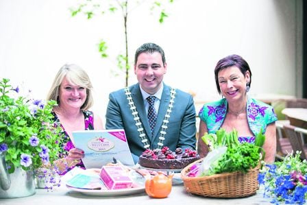 Fiona Field, left, and Helen Collins from A Taste of West Cork Food Festival with County Mayor Cllr John Paul OShea at Kalbos Café at the Uillinn Arts Centre in Skibbereen for the launch of the 12th annual festival. 