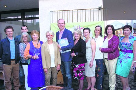 Minister Simon Coveney, centre, with committee members, from left: Michéal Hurley, Rosaleen ODriscoll, Kevin Collins, Eithne McCarthy, Lal Thompson, Fiona Field, Siobhan O