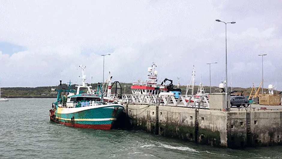 Lifeboats difficult shout to recover trawler Image