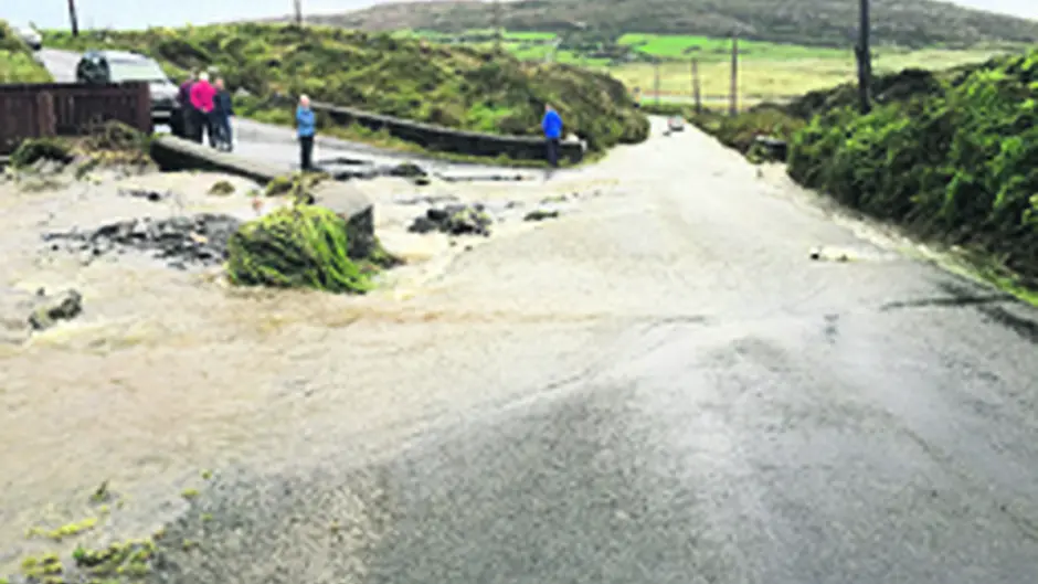 Driver and kids have a lucky escape in flooding Image