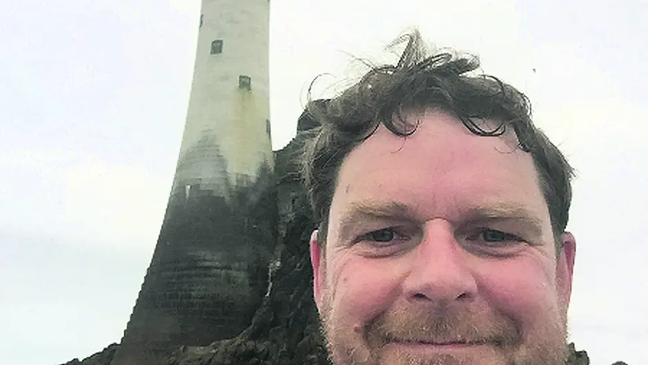 Simon's big adventure as he rows to Fastnet in his father's oarste Image