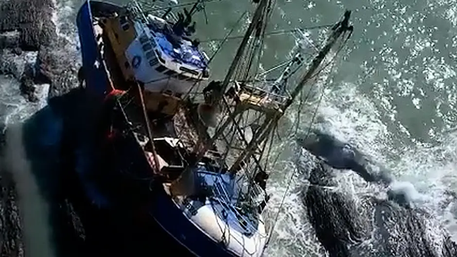 Spectacular drone footage of abandoned trawler on rocks in Kinsale Harbour Image
