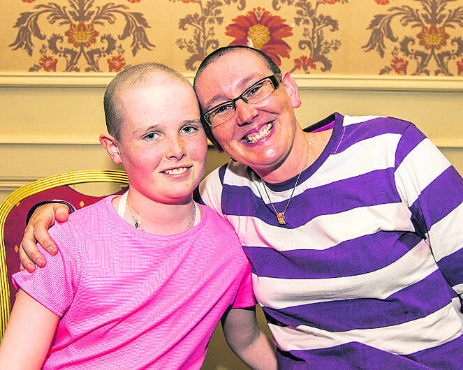 Aoife's coach shaves head in solidarity Image