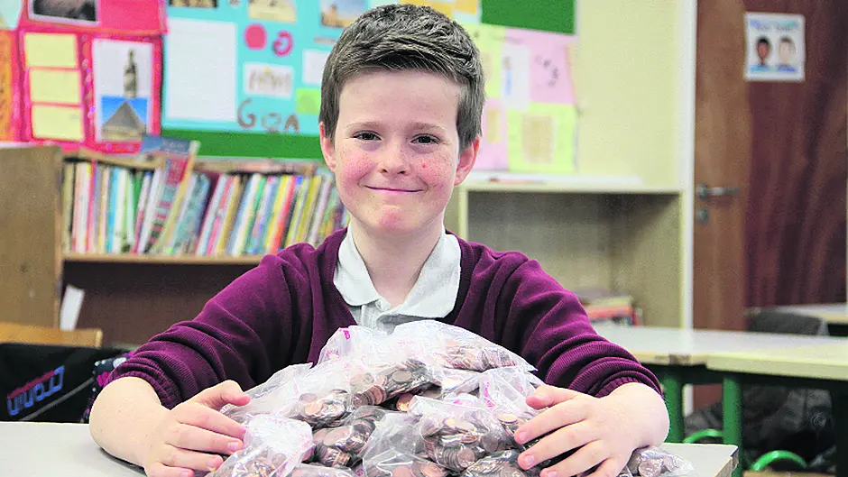 Kilmeen student Peter coins it for charity Image