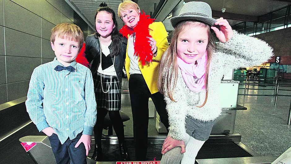 Airport staff hit the runway for fashion show Image