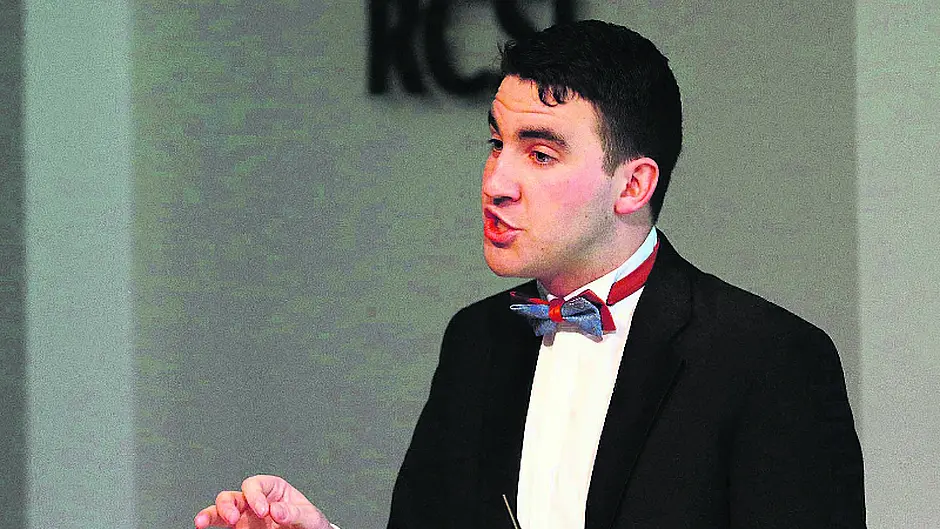 Ross' trainee solicitor wins university debate Image