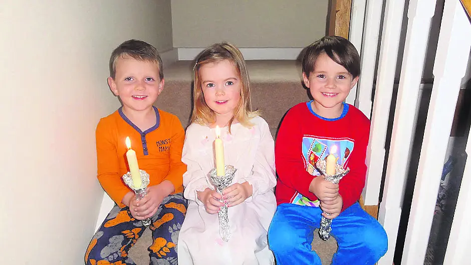 Glowing in the same ‘Candlelight' as their parents Image
