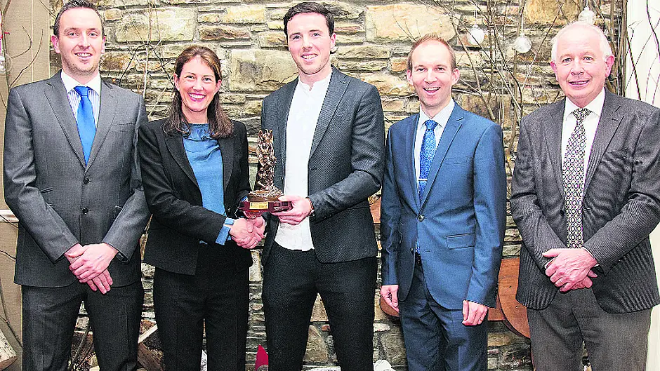 County champs host fundraising auction for team holiday Image