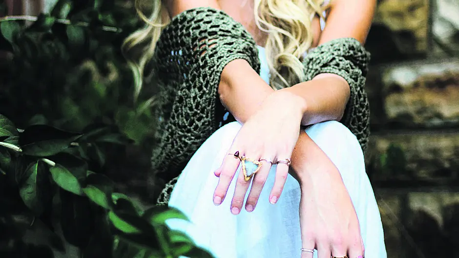 Layer on the sun cream – and the bangles for a great beach look Image
