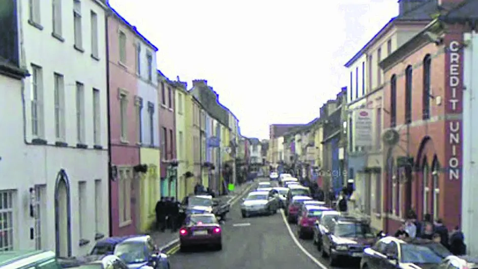Cars being damaged on narrow Skibb street Image