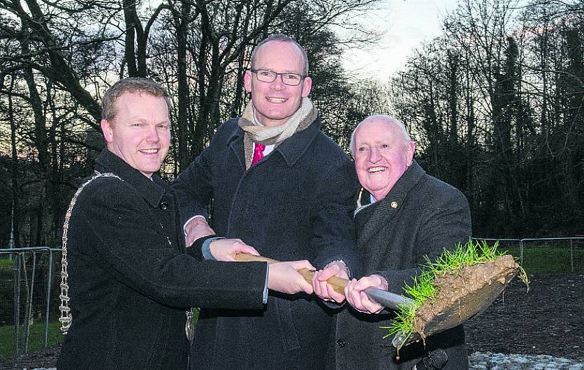 Minister Coveney turns sod on Carrigaline's new Men's Shed Image