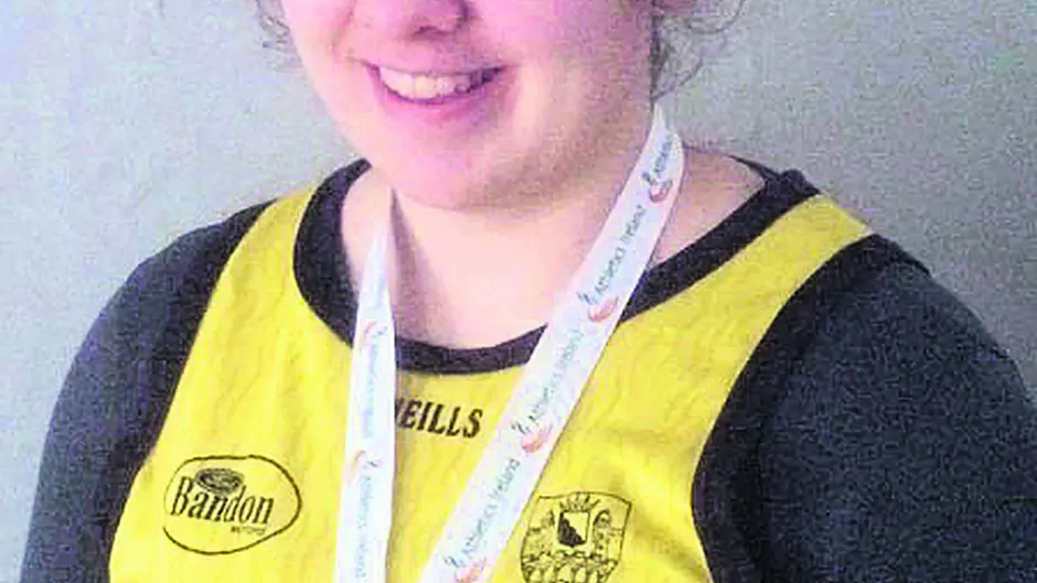 Laura's joy on a golden weekend for Bandon AC Image