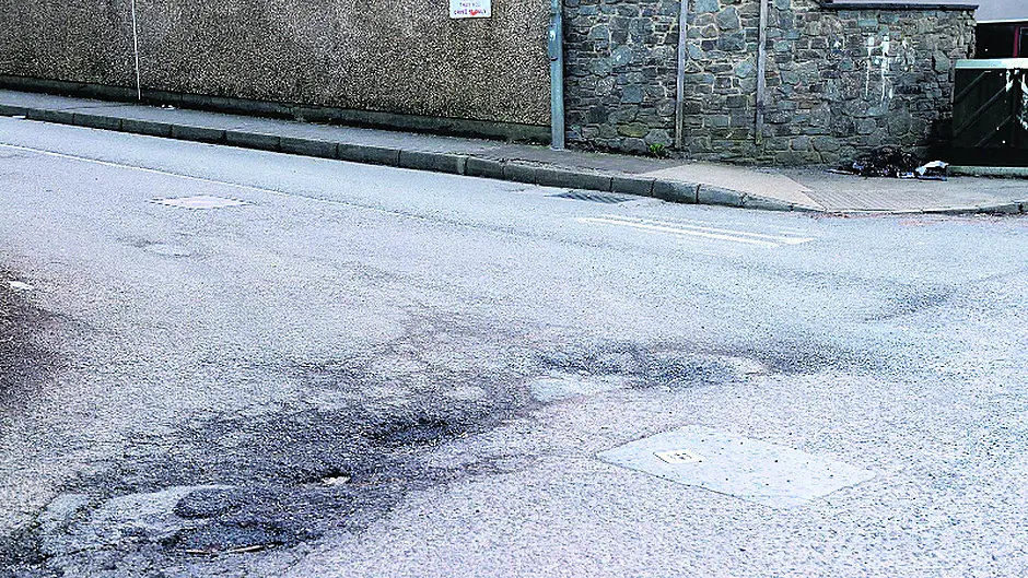 Cllr ‘hit a walloper' of a pothole Image