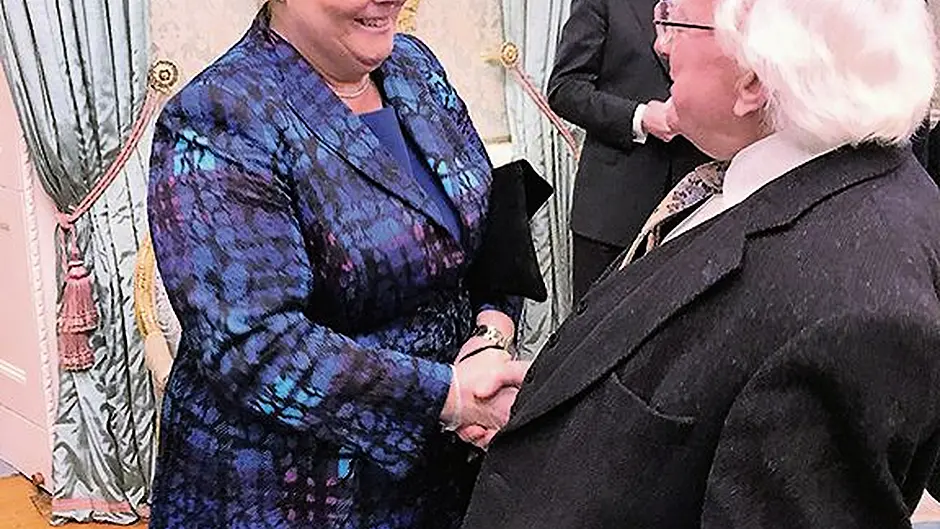 Jacqueline honoured for Irish support at Áras an Uachtaráin Image