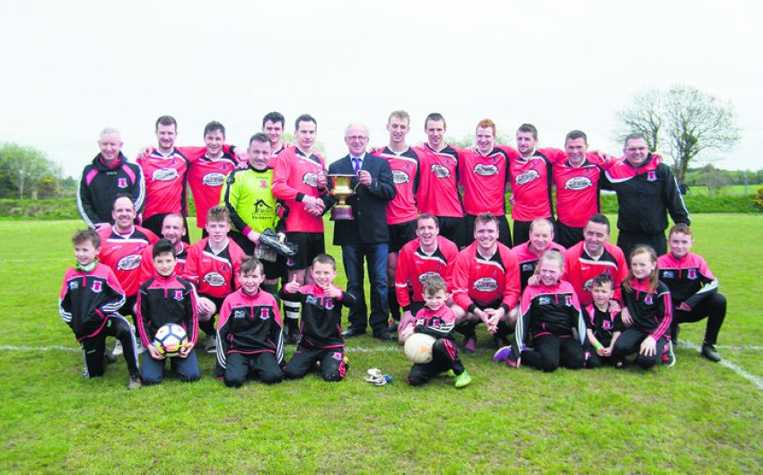 Oldham (52) gets his hands on Premier Division medal Image