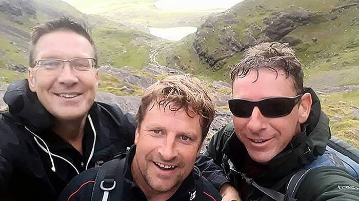 Beara trio take on  top peak Image