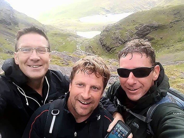 Beara trio take on  top peak Image