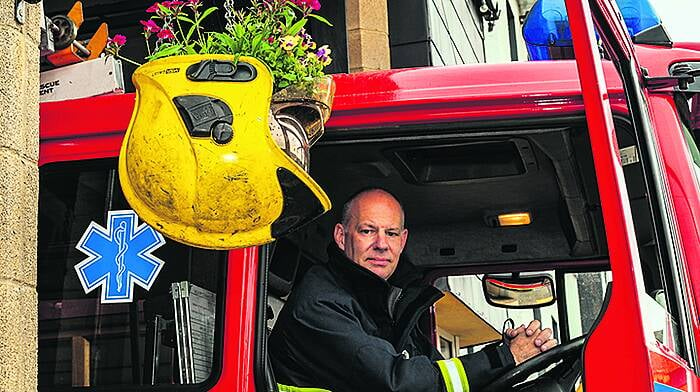 Hat's a really great idea by Bantry Fire Brigade as helmets get flower power Image