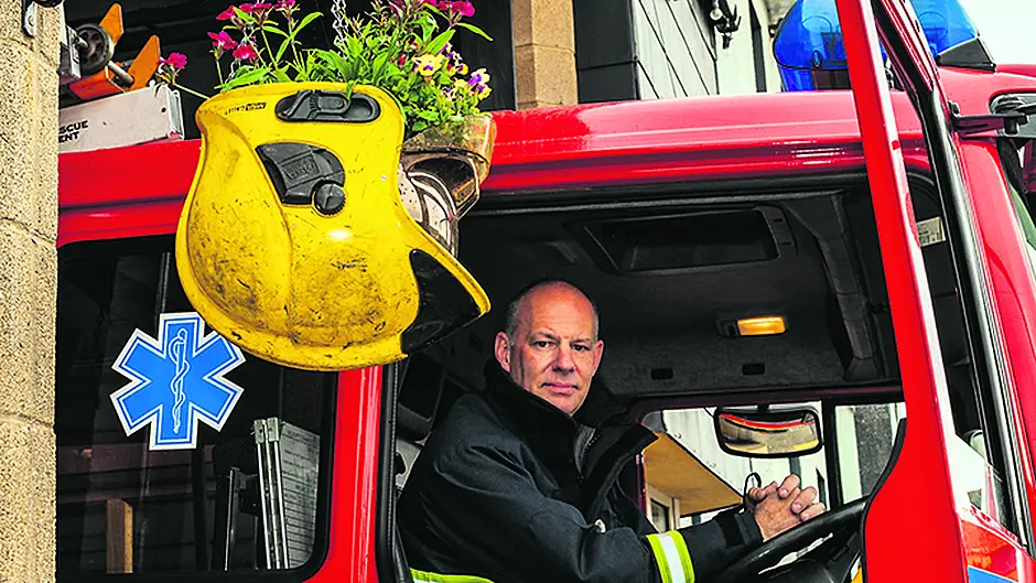 Hat's a really great idea by Bantry Fire Brigade as helmets get flower power Image