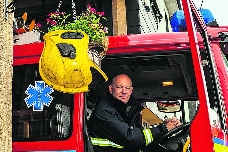 Hat's a really great idea by Bantry Fire Brigade as helmets get flower power Image